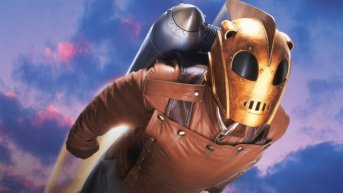 Un ritorno atteso da tempo: Sembra che The Rocketeer prenderà di nuovo il volo: il reboot del film ha finalmente trovato uno sceneggiatore Un ritorno atteso da tempo: Sembra che The Rocketeer prenderà di nuovo il volo: il reboot del film ha finalmente trovato uno sceneggiatore
