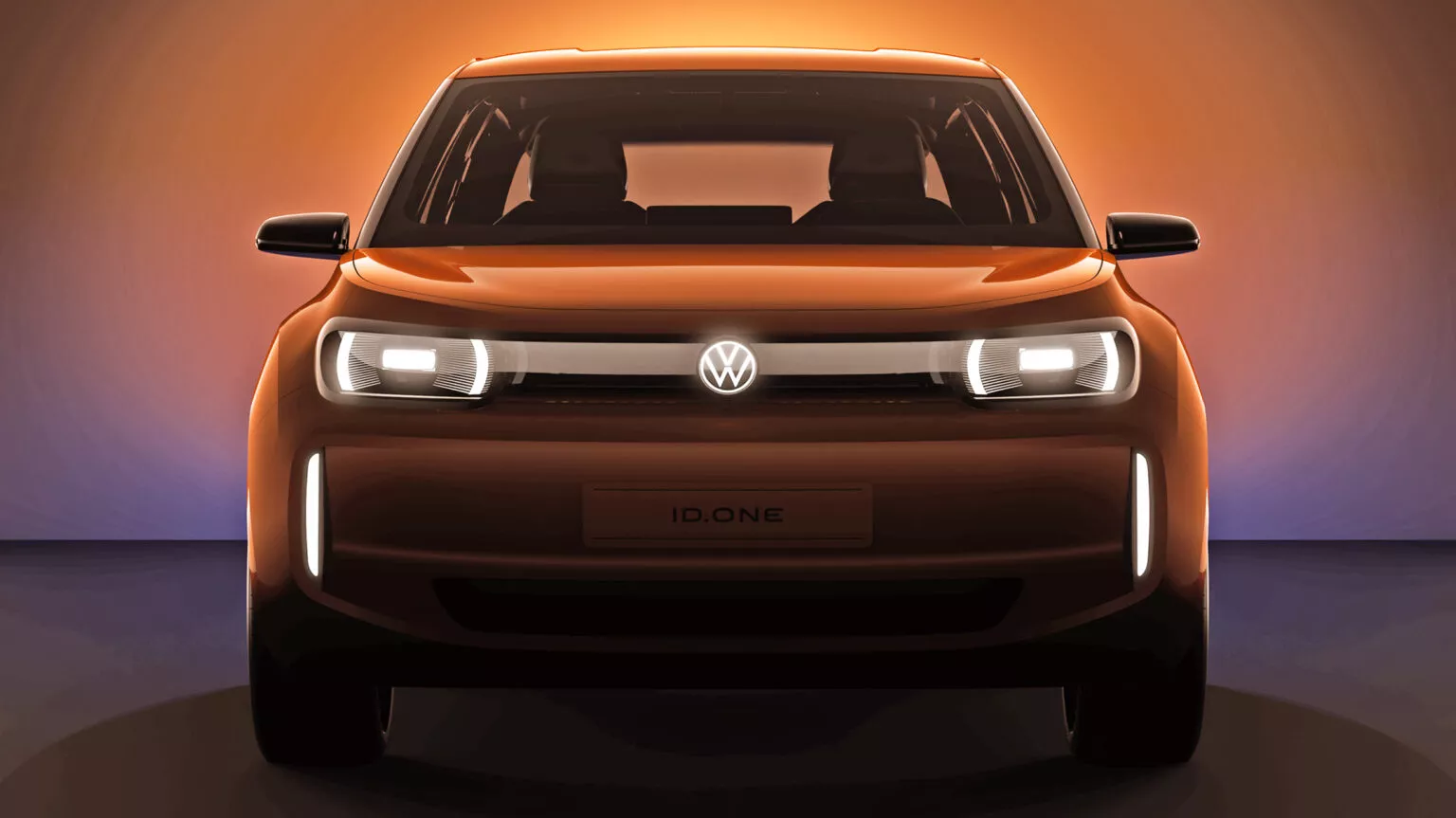 Primo teaser della nuova auto elettrica di Volkswagen con la scritta "ID.One" al posto della targa.